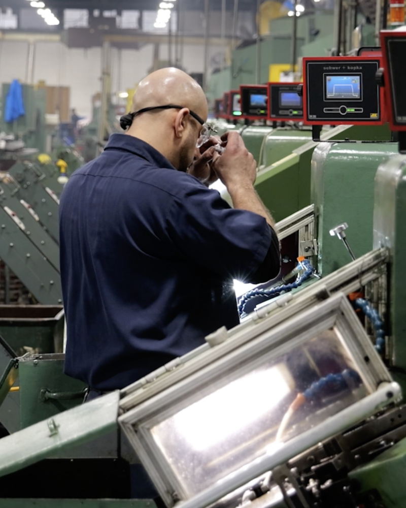 Indoor walkthrough of the EJOT ATF production line