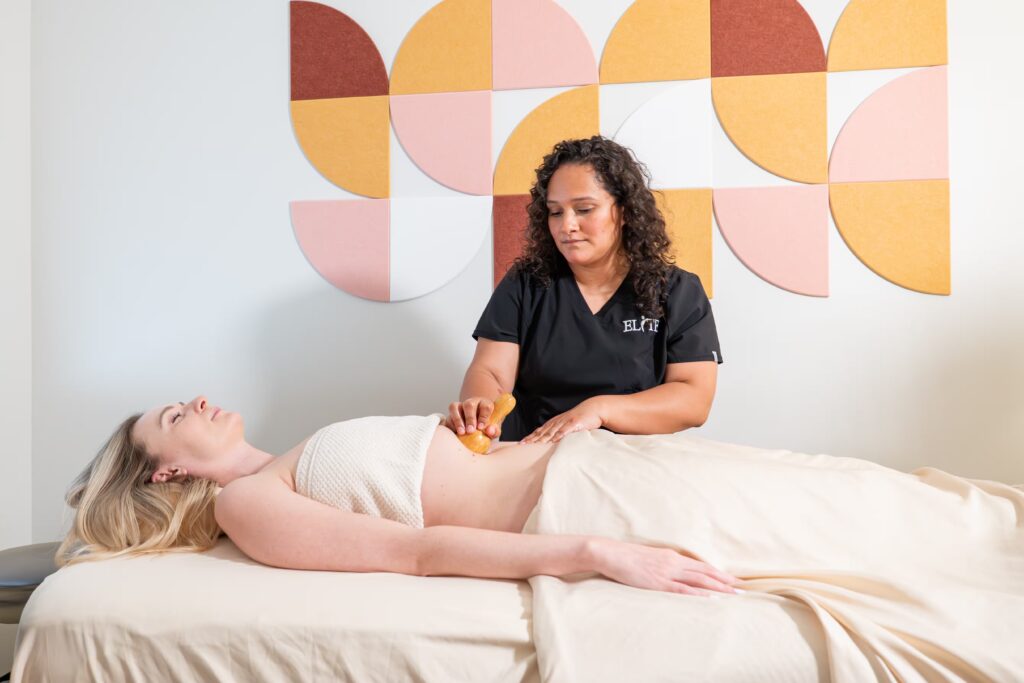 Photoshoot: Practitioner performing acupuncture at a North Shore wellness clinic